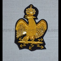 Aigle de retroussis brodé