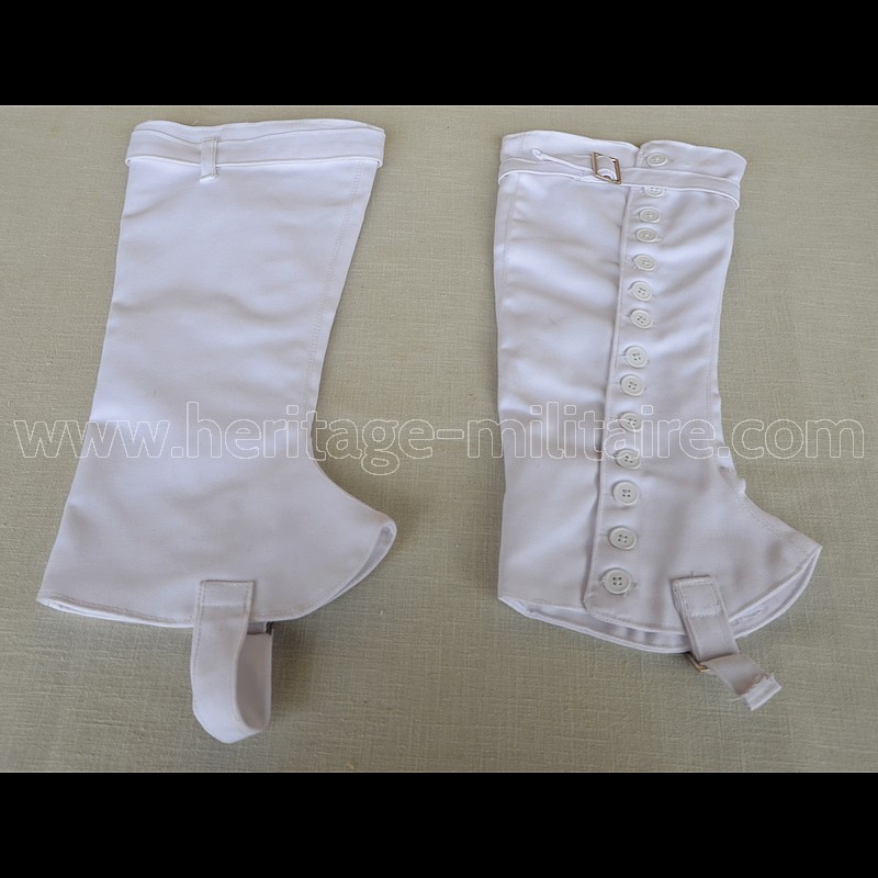 White canvas gaiters, high model, pair, with plastic buttons